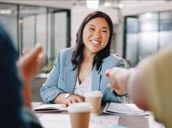 Business woman, handshake and success in meeting